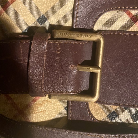 Burberry purse with browns leather straps and snap front with opening - Picture 12 of 13
